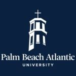 Against a dark blue background is the white silhouette of a lighthouse with a cross on the top. Below reads "Palm Beach Atlantic University."